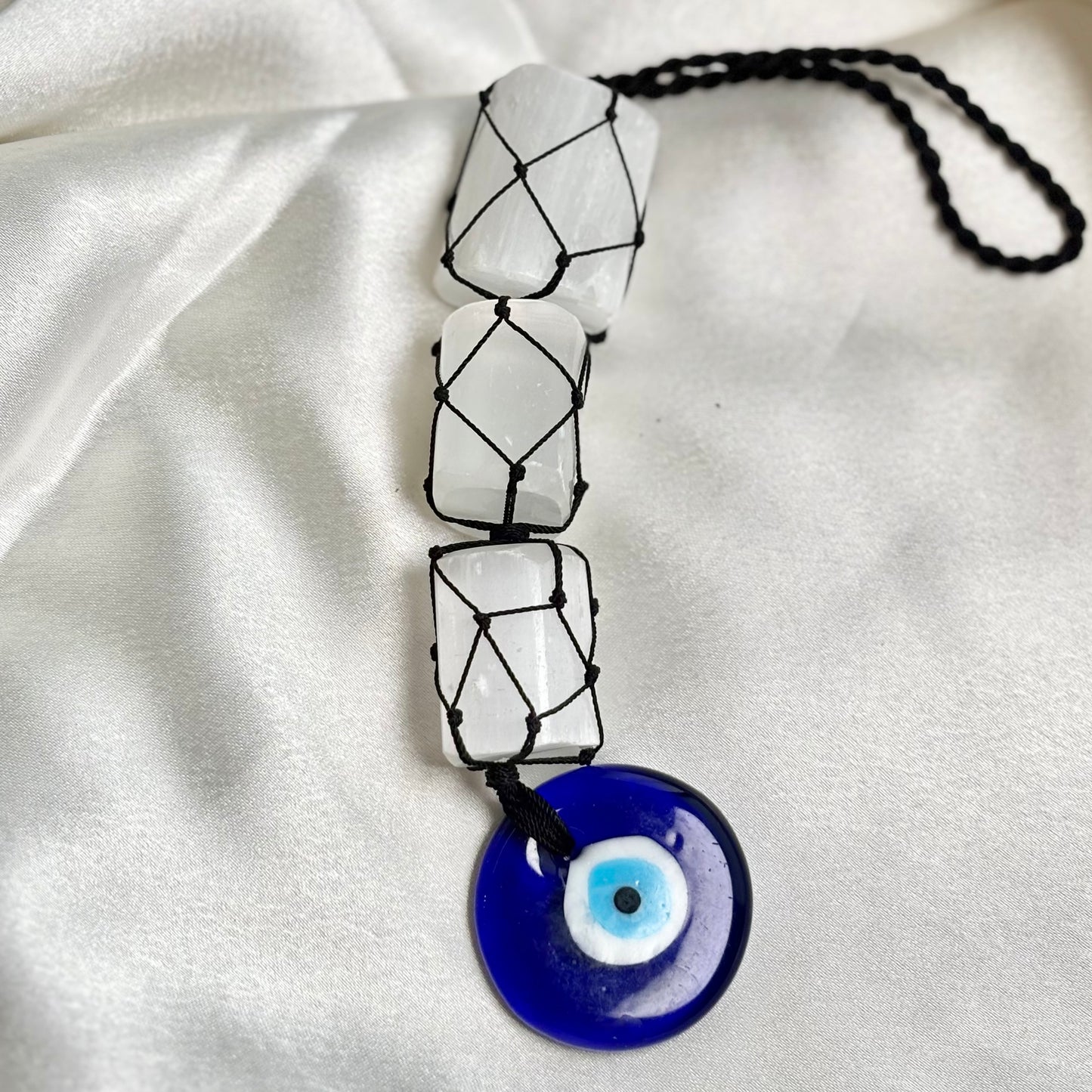 Selenite Tumble Dangler with Evil Eye Charm?