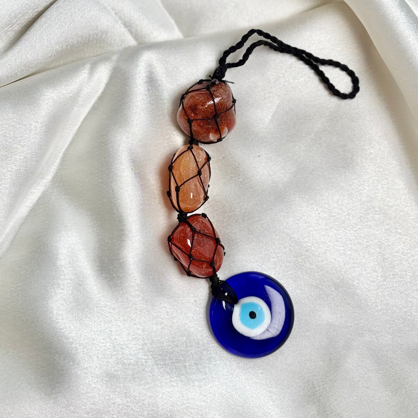 Orange Carnelian Tumble Dangler with Evil Eye Charm?