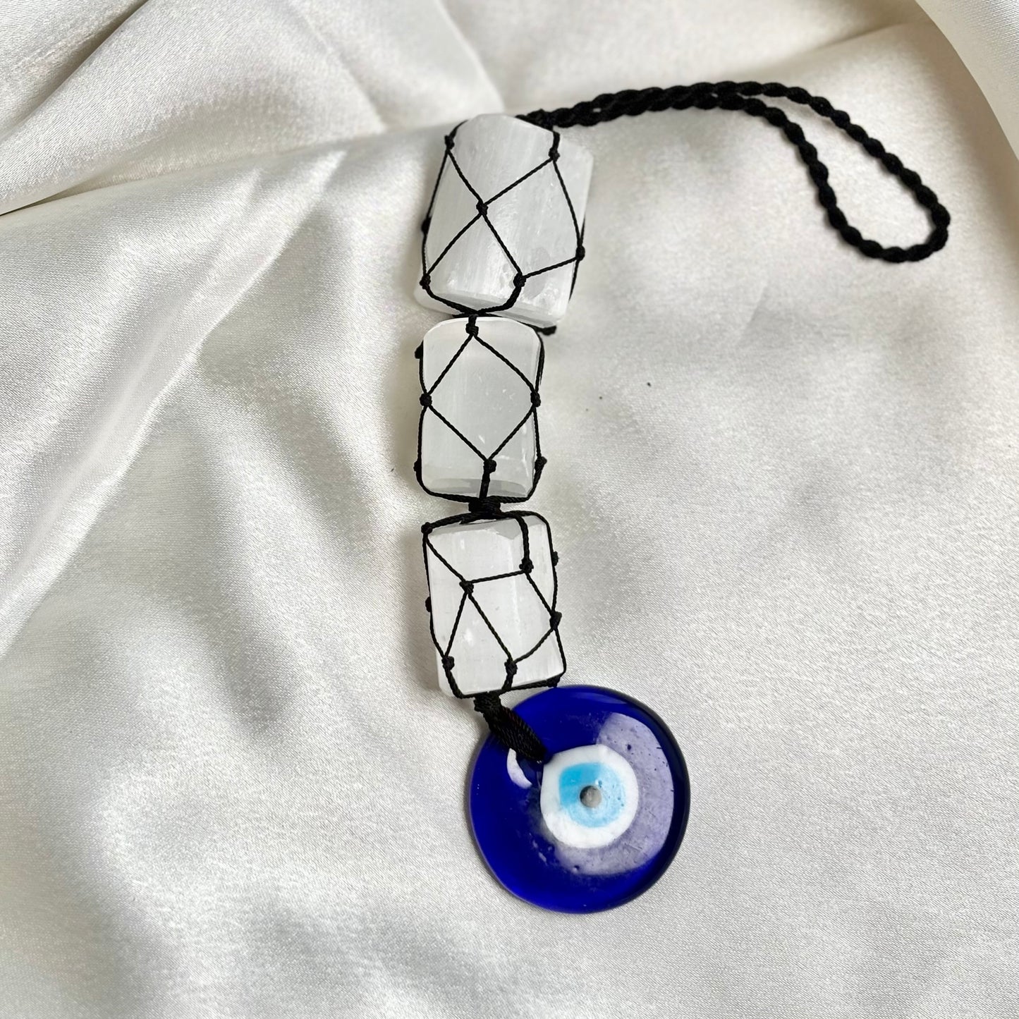 Selenite Tumble Dangler with Evil Eye Charm?